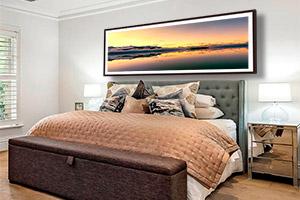 Sample of a bedroom with wall art.